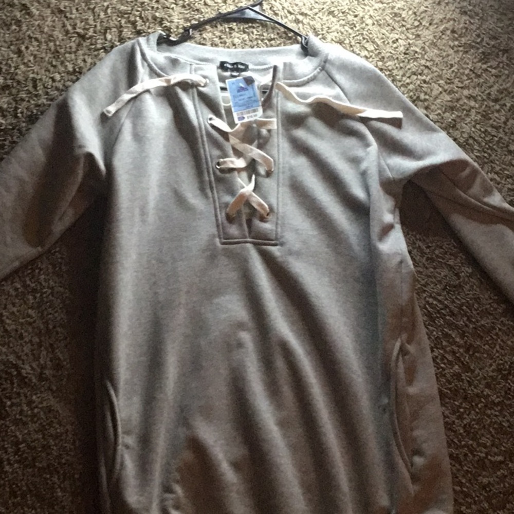 A long sleeve cross up dress.